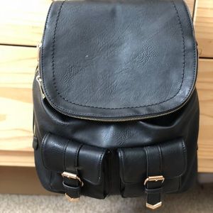 Plain black backpack